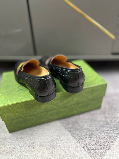 Gucci GG Debossed With Debossed Monogram Loafer In Black